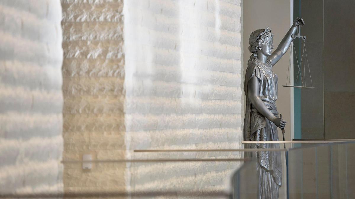 The “Lady Justice” statue from the old courthouse was relocated to the second floor of the new Johnson County Courthouse and overlooks the lobby. The $193 million courthouse in Olathe opened in January 2020.