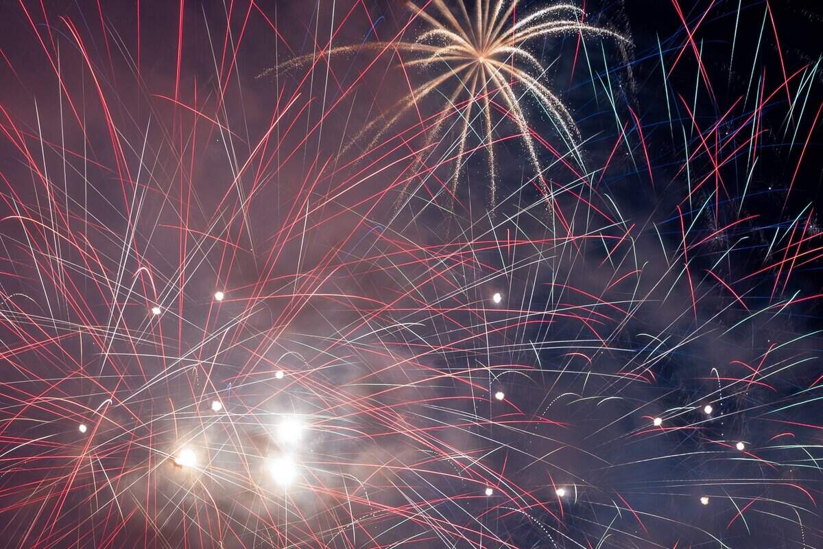 Fireworks light up the night sky over Penn Valley Park on Saturday, July 4, 2026. The National WWI Museum and Memorial's Stars and Stripes Picnic celebrates America's 250th and the Memorial's 100th