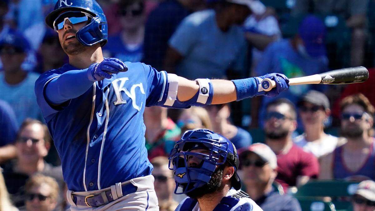 Kansas City Royals’ Whit Merrifield watches his sacrifice fly to Chicago Cubs left fielder Ian Happ in the fourth inning of a baseball game Sunday, Aug. 22, 2021, in Chicago. (AP Photo/Nam Y. Huh)