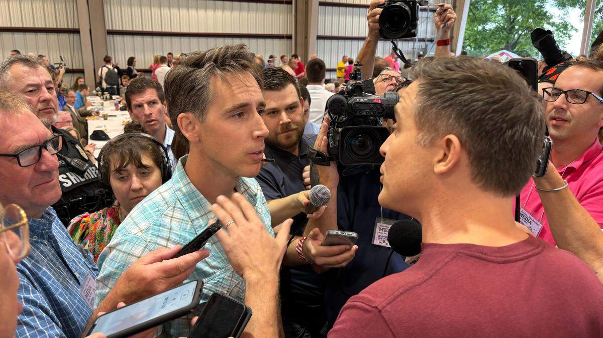 Republican Sen. Josh Hawley and Democrat Lucas Kunce argue at the Missouri State Fair on Thursday.