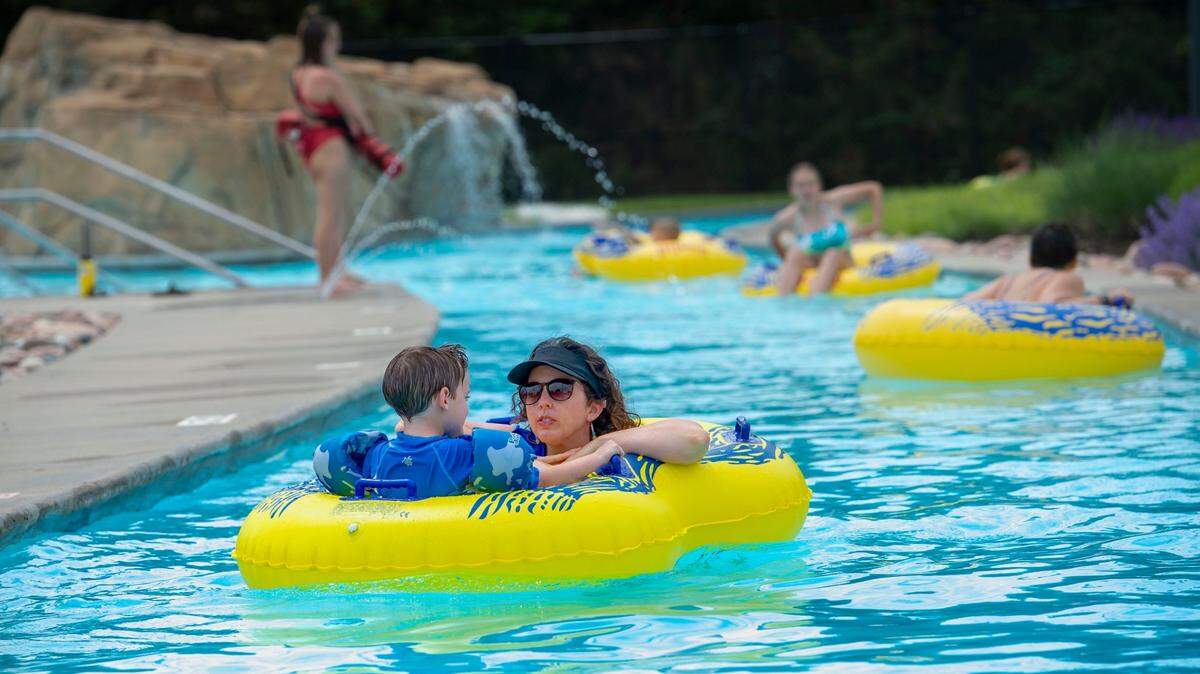 Swimmers enjoy the Black Bob Bay pool complex in Olathe.