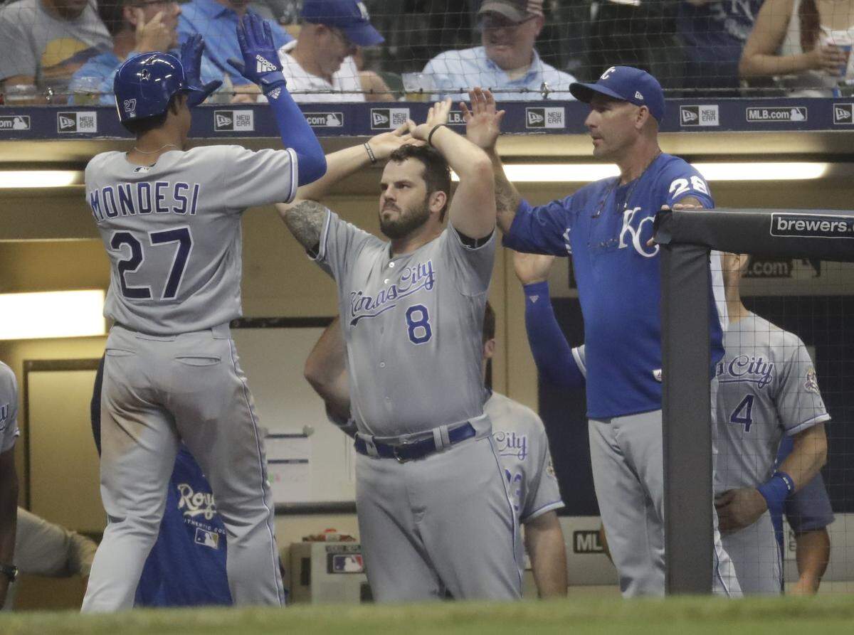 Kansas City Royals' Adalberto Mondesi is congratulated after hitting a home run during the eighth inning of a baseball game against the Milwaukee Brewers on Tuesday, June 26, 2018, in Milwaukee.
