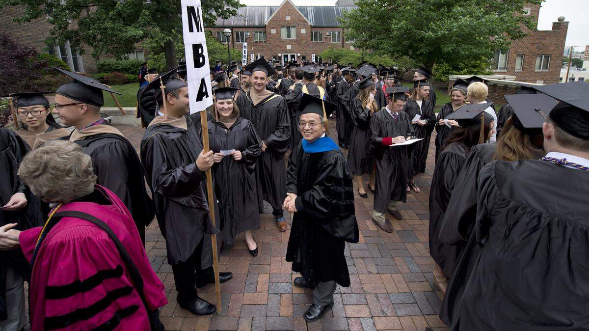 University of Missouri-Kansas City professor Michael Song (center) oversaw an effort to inflate the reputation of the Bloch School's Institute for Entrepreneurship and Innovation, The Star found in a 2014 investigation. The investigation began after whistleblower Richard Arend accused the business school of falsifying data in pursuit of academic rankings. Song later resigned.