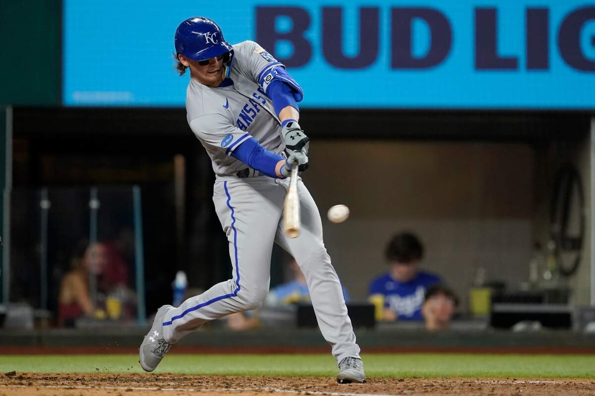 Kansas City Royals rookie Bobby Witt Jr. connects for a two-run double in the fifth inning of Wednesday’s baseball game against the Texas Rangers in Arlington, Texas.
