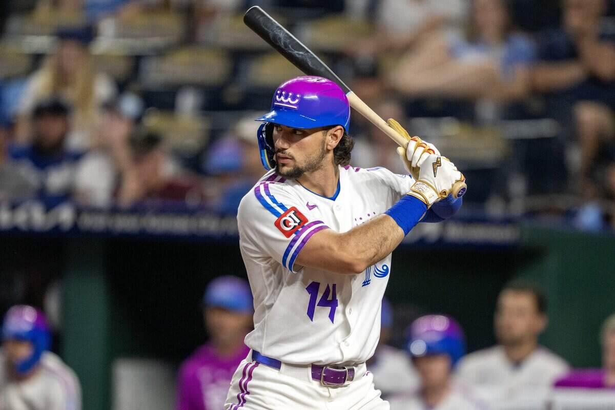 Wearing the Kansas City Royals' new "Forever Fountains" City Connect uniform, right fielder Jac Caglianone (14) waits for a pitch in the ninth inning against the Houston Astros on Friday, June 12, 2026, at Kauffman Stadium in Kansas City.