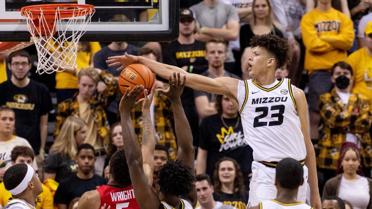 Missouri’s Trevon Brazile, right, blocks a shot from Georgia’s Christian Wright during a game Saturday, March 5, 2022, in Columbia, Mo. Missouri won 79-69.