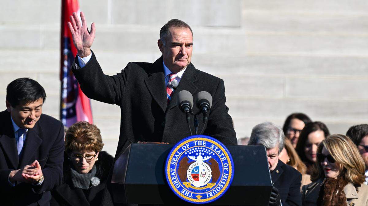 Missouri Governor Mike Kehoe waves to the crowd after being sworn in as the state’s 58th governor Monday at inauguration ceremonies in Jefferson City.