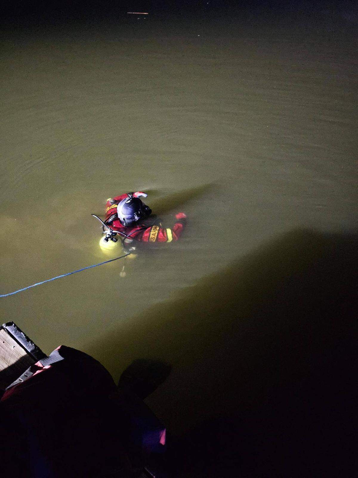 A diver with Lee’s Summit Underwater Rescue and Recovery entered Longview Lake Friday night to help remove a truck from the water, according to the organization’s Facebook post.