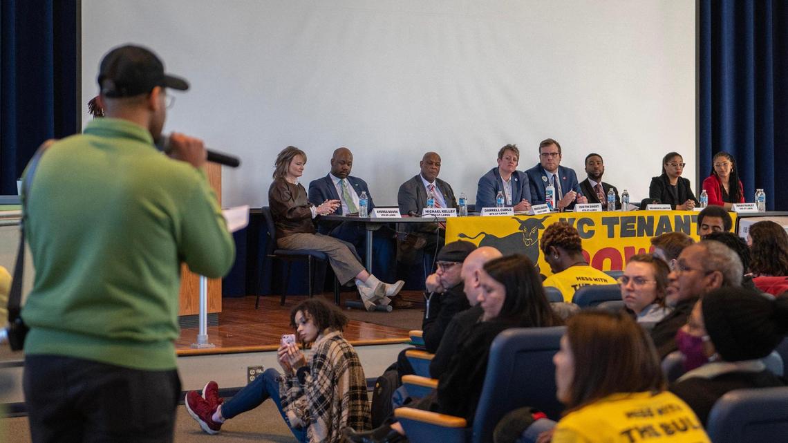 A community member asks questions Saturday at a KC Tenants Power sponsored panel in the Mohart Center auditorium, candidates running in the April 4 city council primary were asked to address the metro’s affordable housing crisis.