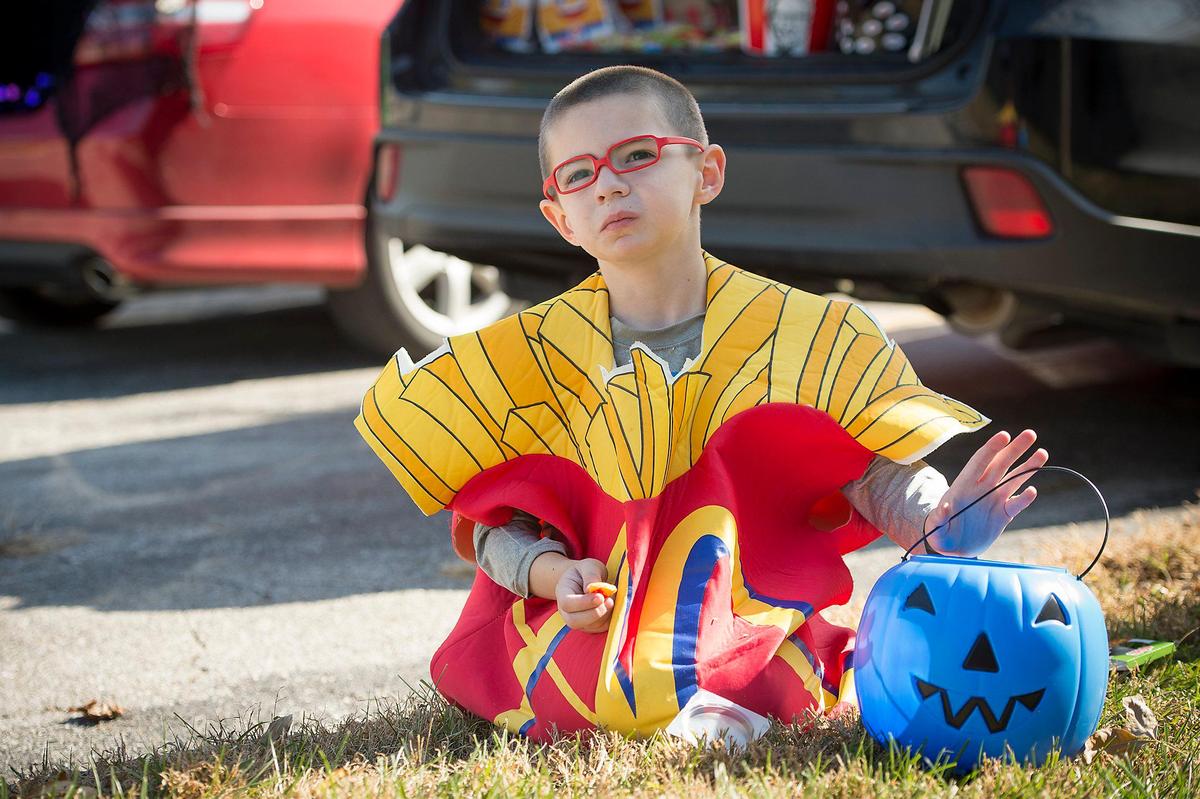 Brooks Silvey, 7, of Olathe, plans to use a blue pumpkin on Halloween night to signal that he is on the autism spectrum.