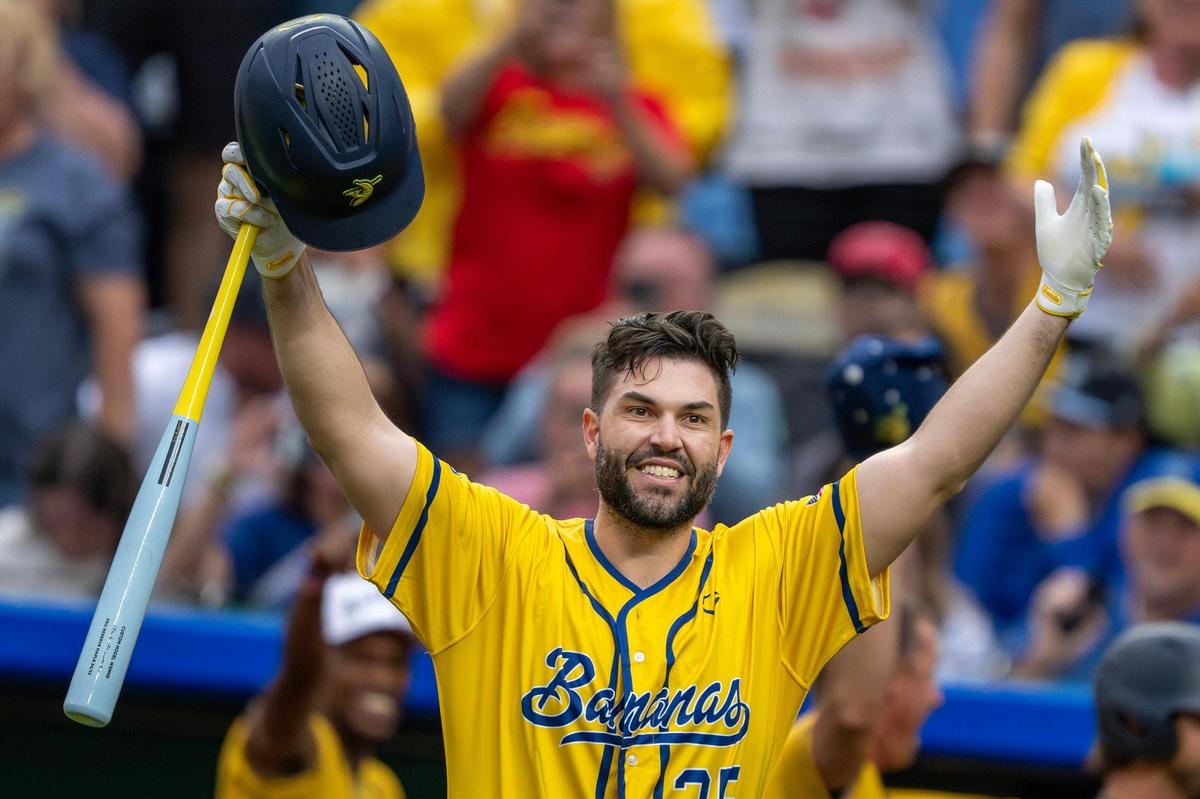 Former Kansas City Royals first baseman Eric Hosmer surprises fans during a dance routine at the Savannah Bananas game.