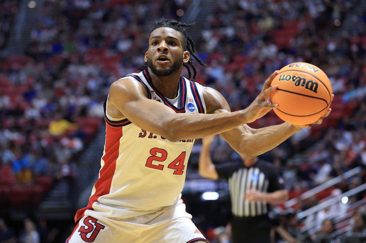 Zuby Ejiofor #24 of the St. John's Red Storm makes a pass against the Northern Iowa Panthers in the first round of the 2026 NCAA Tournament at Viejas Arena on March 20, 2026 in San Diego.