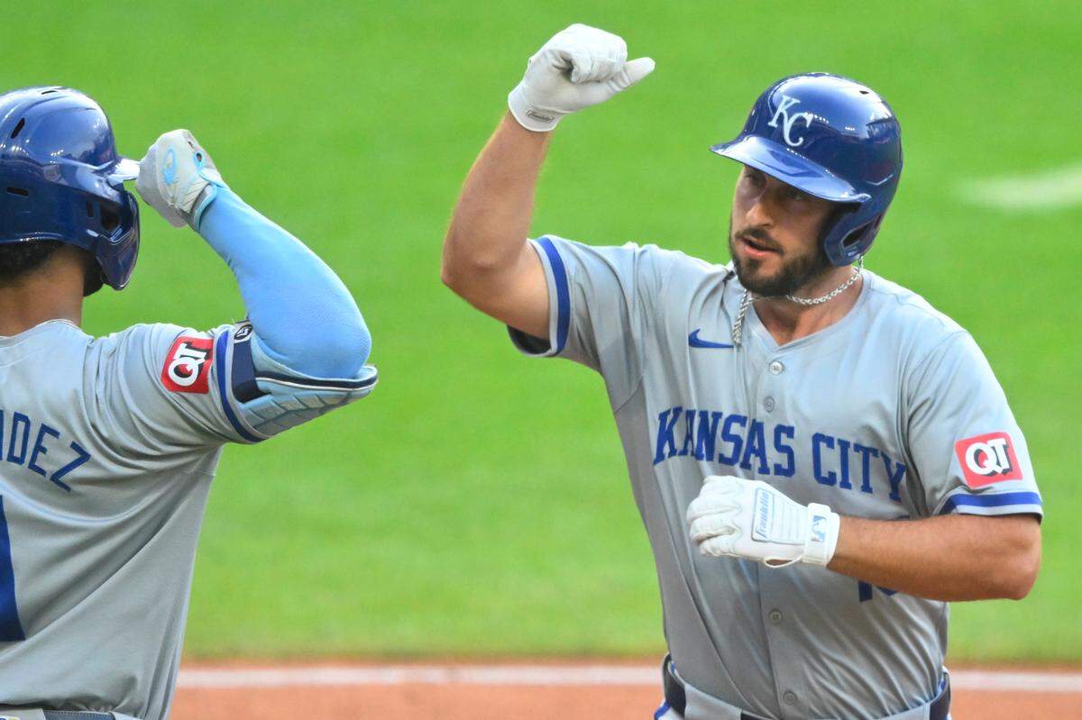 Kansas City Royals left fielder MJ Melendez, left, congratulates third baseman Paul DeJong on the latter’s second-inning home run against the Cleveland Guardians during Monday’s doubleheader nightcap at Progressive Field.
