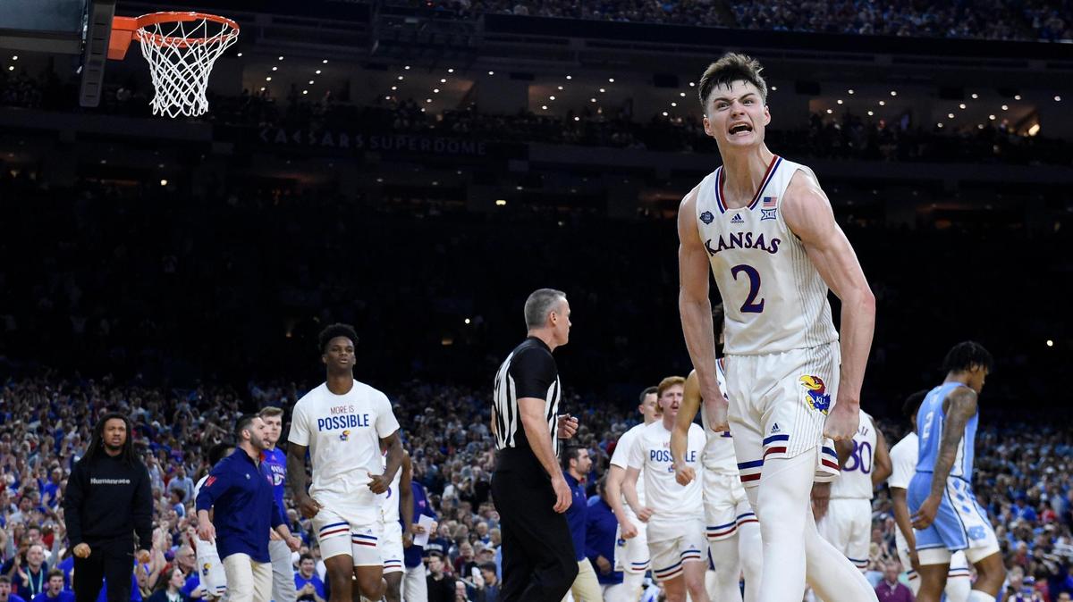 KU’s Christian Braun screams at the crowd after hitting a shot and getting fouled during the second half of Monday night’s NCAA championship game at the Superdome in New Orleans. KU beat North Carolina, 72-69.