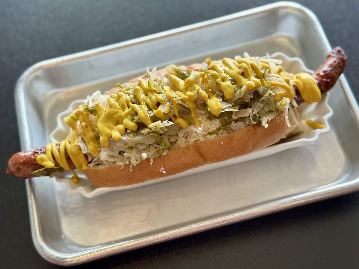 Wiener Kitchen serves a KC Frank, which comes with an all-beef frank, Brussels-kraut, Swiss cheese and yellow mustard.
