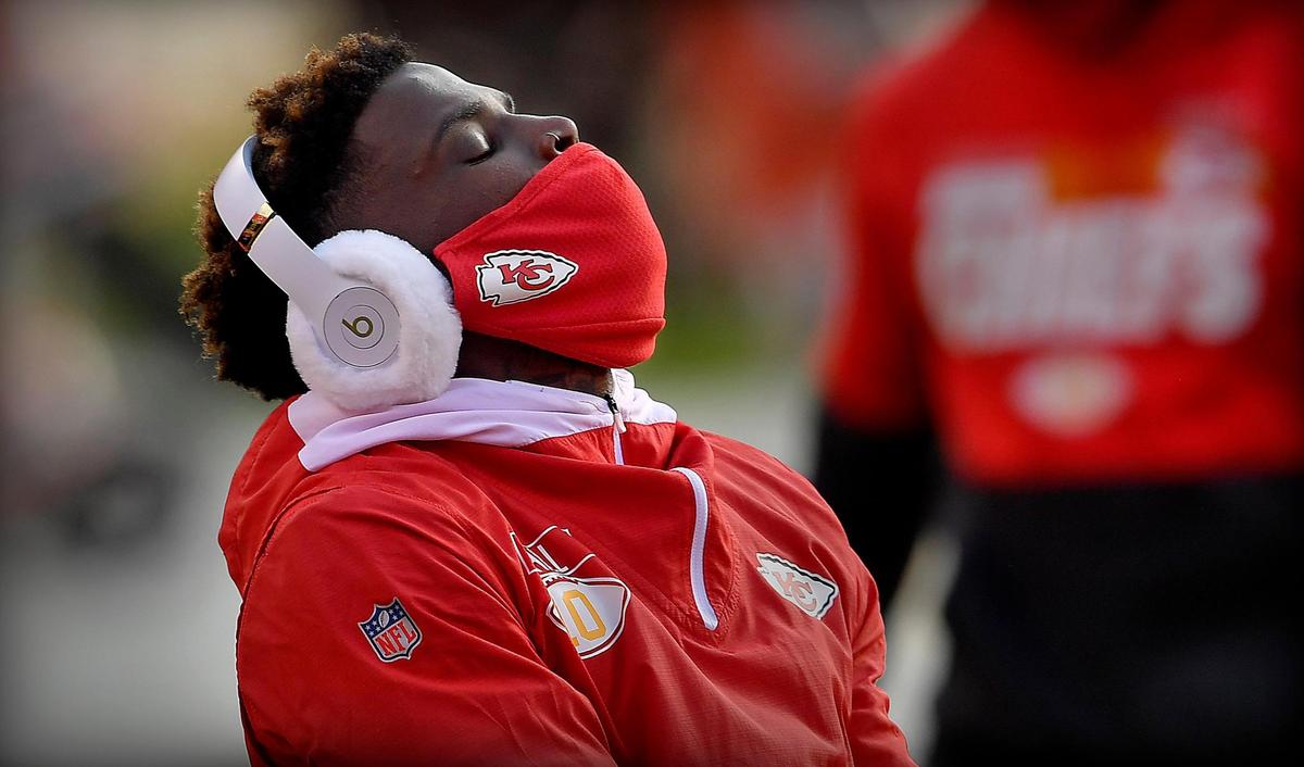 Chiefs wide receiver Tyreek Hill was sporting combination ear muffs and head phones for warmup Sunday at Arrowhead.
