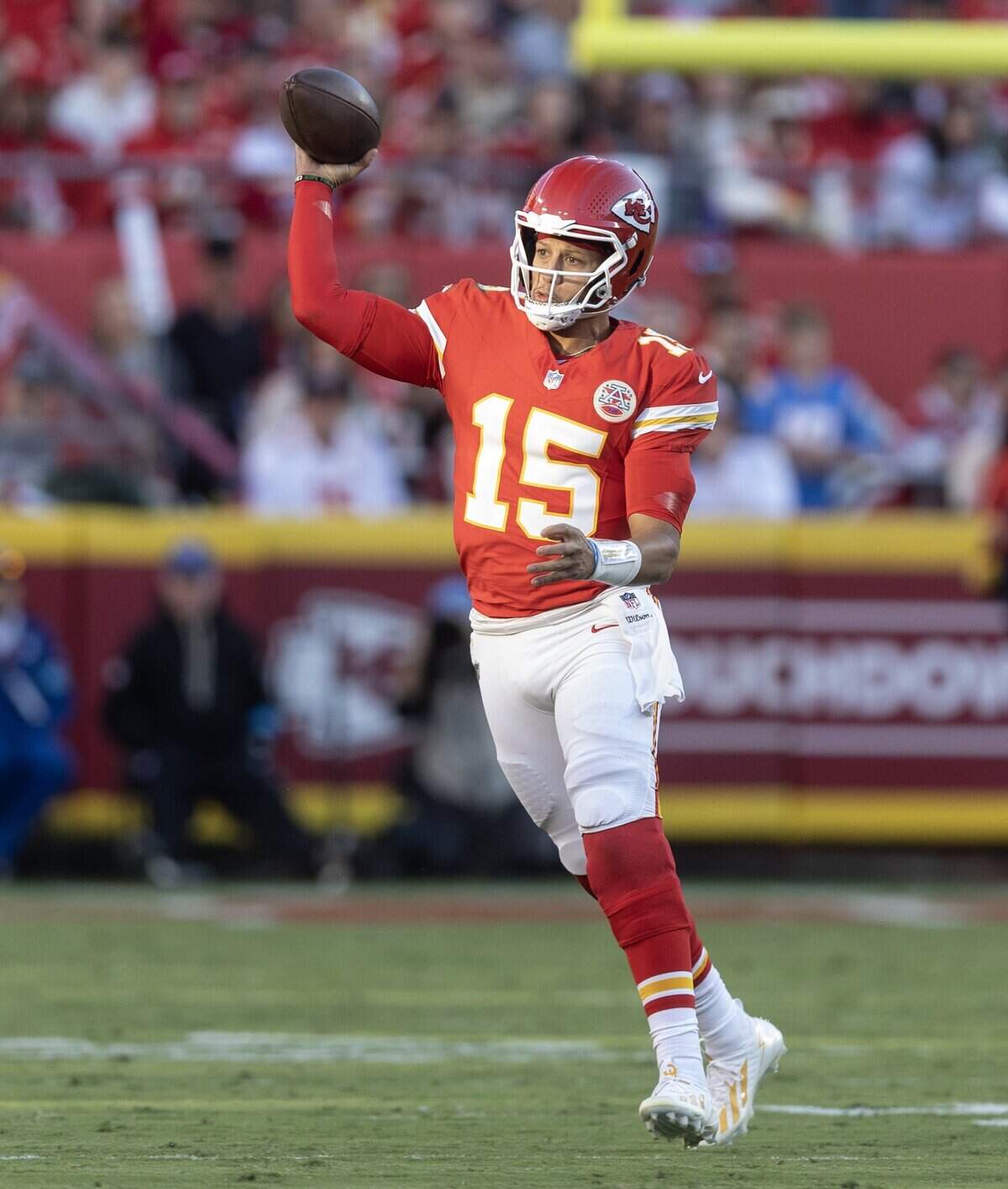 Kansas City Chiefs quarterback Patrick Mahomes (15) throws a pass against the Los Angeles Chargers during the second half on Sunday at Arrowhead Stadium.