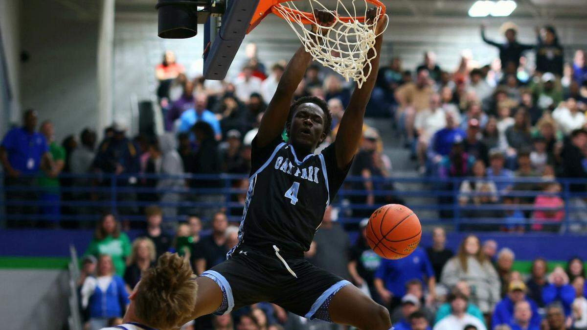 Josh Kori flushes a dunk in Oak Park’s win in the Missouri Class 6 quarterfinals on March 14, 2025.