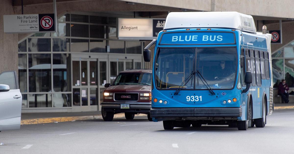 The Blue Bus, an economy parking lot shuttle, arrives at Kansas City International Airport’s Terminal B on Thursday, Dec. 1, 2022, in Kansas City.