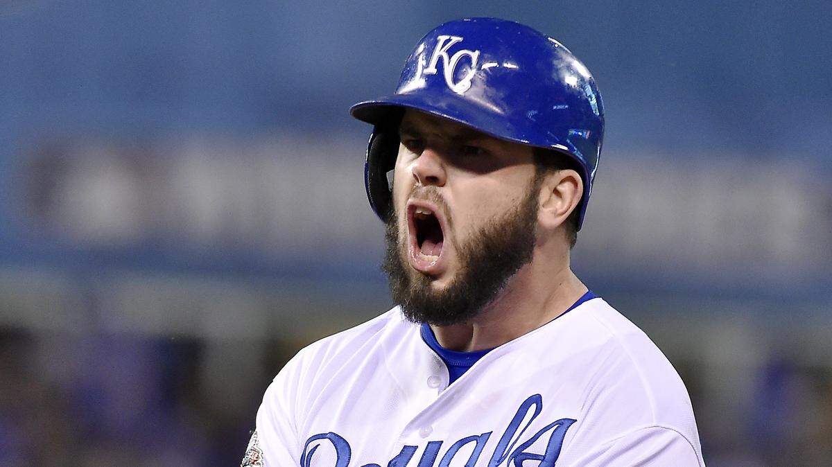 Kansas City Royals third baseman Mike Moustakas celebrates after hitting a single to score first baseman Eric Hosmer in the fifth inning during Game 2 of the World Series on Wednesday, October 28, 2015 at Kauffman Stadium in Kansas City, Mo.