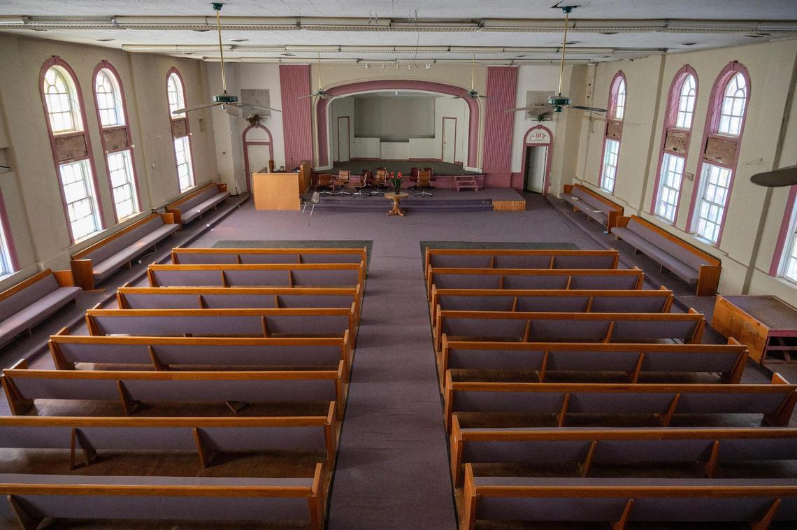 Purple carpet adorns the great hall of the Justice and Dignity Center building on Wednesday, March 20, 2024, in Kansas City. The large auditorium is rarely used these days, but once hosted raucous dances.