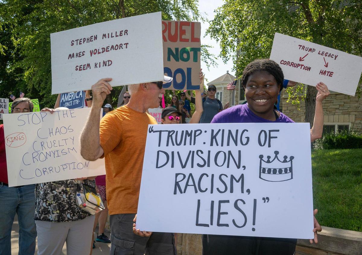 Protesters spoke out, marched and rallied as part of a nationwide “No Kings” day of defiance on Saturday, June 14, 2025, in Lenexa, Kansas. The events protest President Donald Trump and immigration policies, among other issues.