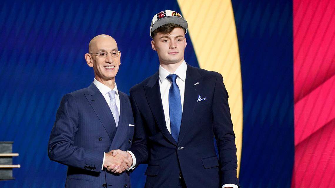 Christian Braun was congratulated by NBA Commissioner Adam Silver after being selected 21st overall by the Denver Nuggets in the 2022 NBA Draft in New York.