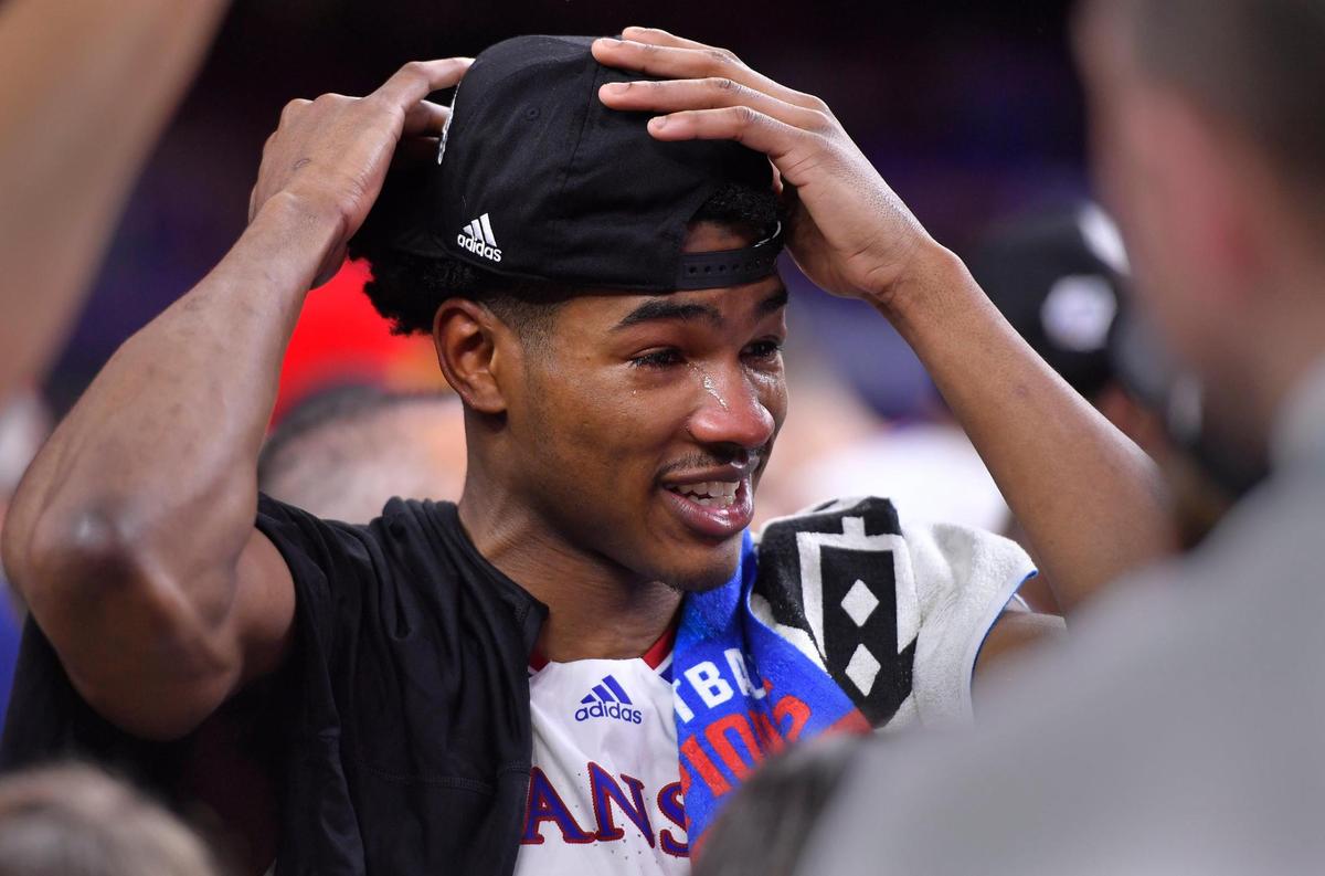 Tears of joy streamed down the face of KU senior Ochai Agbaji after the Jayhawks beat North Carolina 72-69 Monday night in New Orleans to claim the NCAA title.