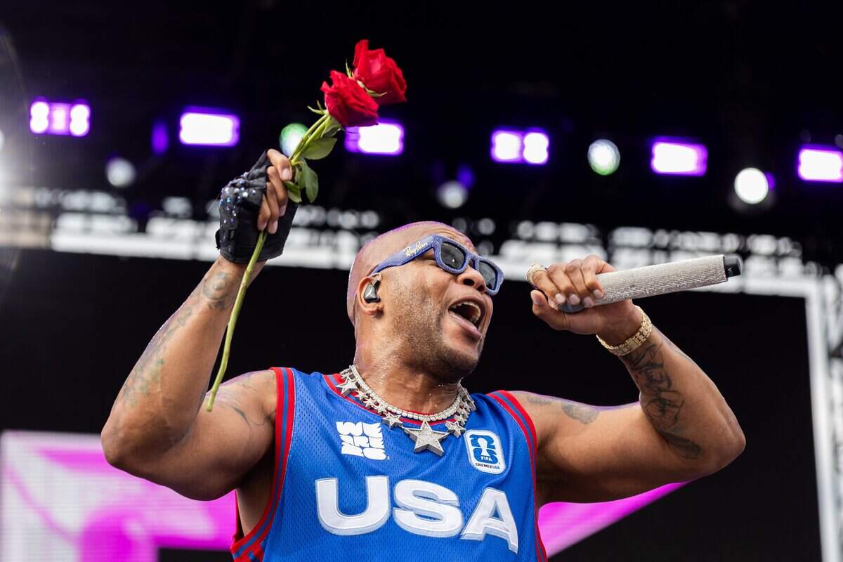 Flo Rida throws roses out to the ladies in the audience during their FIFA Fan Fest concert at Fan Fest on Friday, June 19, 2026.