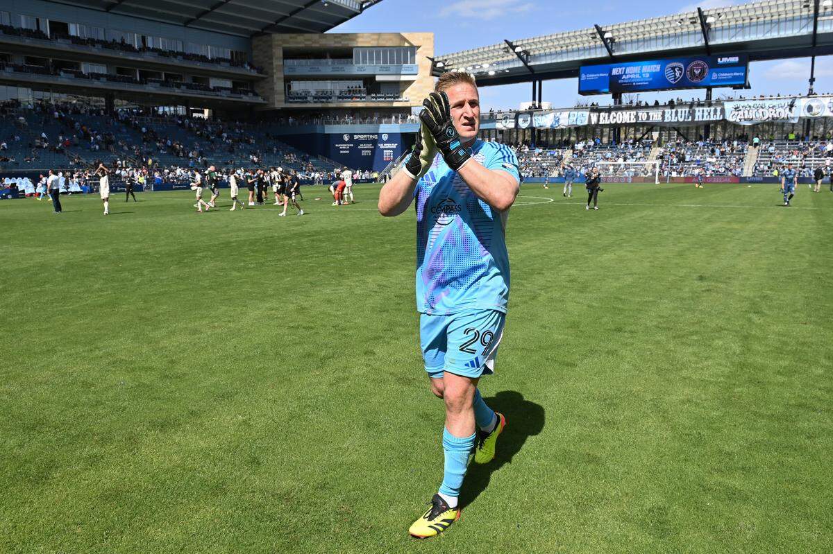 Sporting Kansas City goalkeeper Tim Melia applauds the home fans after the team’s match against the Portland Timbers at Children’s Mercy Park.
