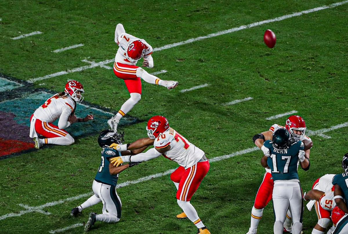 Kansas City Chiefs place kicker Harrison Butker kicks the game-winning field goal in the final seconds of the game against the Philadelphia Eagles during Super Bowl LVII Sunday, Feb. 12, 2023, in Glendale, Ariz.