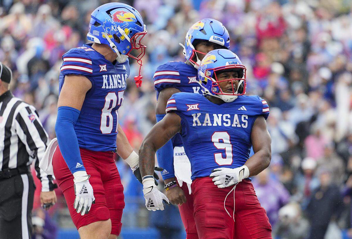 Former KU Jayhawks running back Daniel Hishaw (No. 9) celebrates a touchdown against the Kansas State Wildcats on Oct. 25, 2025 in Lawrence, Kansas.
