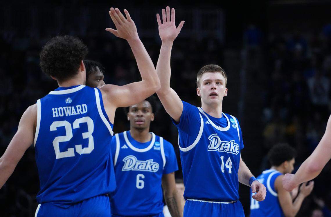 Drake Bulldogs guard Bennett Stirtz (14) celebrates with Isaia Howard (23) after a play in the second half of a first round men’s NCAA Tournament game against the Missouri Tigers at Intrust Bank Arena on March 20, 2025.