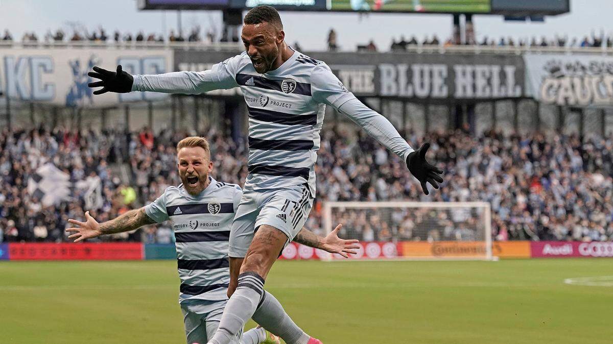 Sporting Kansas City forward Khiry Shelton (front), and forward Johnny Russell celebrated after Shelton scored a goal during the first half of a November game against the Vancouver Whitecap at Children’s Mercy Park in Kansas City, Kan.