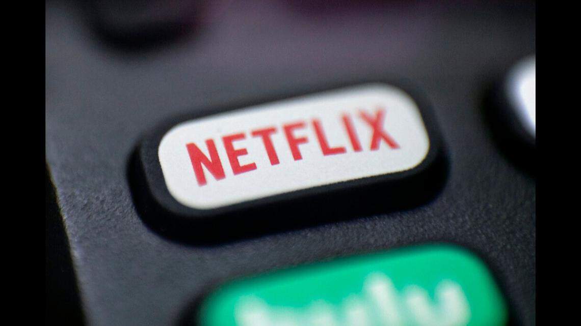 FILE - This Aug. 13, 2020 file photo shows a logo for Netflix on a remote control in Portland, Oregon.. (AP Photo/Jenny Kane, File)