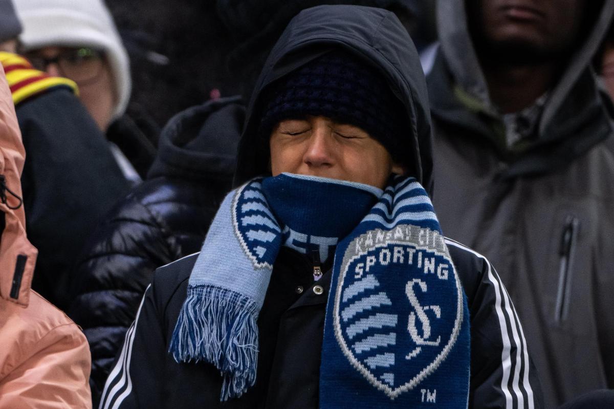 A Sporting KC fan winces from the cold at the Concacaf Champions Cup match of Sporting KC vs. Inter Miami CF on Wednesday, Feb. 19, 2025, at Sporting Park. The temperatures were in the single digits for the game that Sporting KC lost to Miami 0-1.