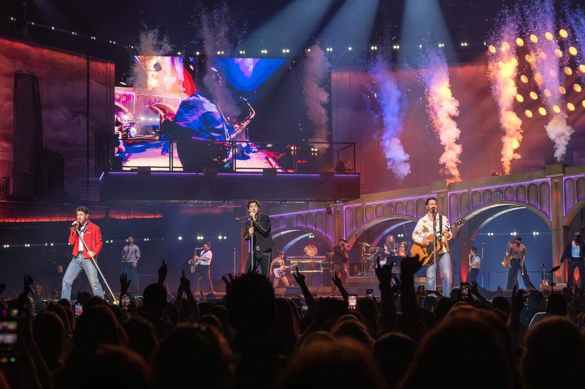 The Jonas Brothers perform the song “Love Me To Heaven,” during their Jonas 20: Greetings from Your Hometown tour at T-Mobile Center on Tuesday, Oct. 7, 2025, in Kansas City.