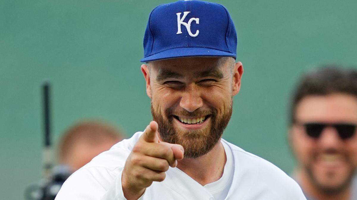Kansas City Chiefs tight end Travis Kelce reacts after throwing out the first pitch prior to a game between the Cincinnati Reds and the Kansas City Royals at Kauffman Stadium on June 12, 2023.
