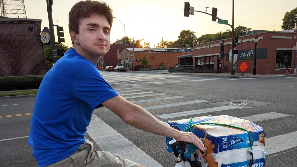 Zack Brown rides his bicycle to get to work and run errands, and having a protected track makes it faster and safer.