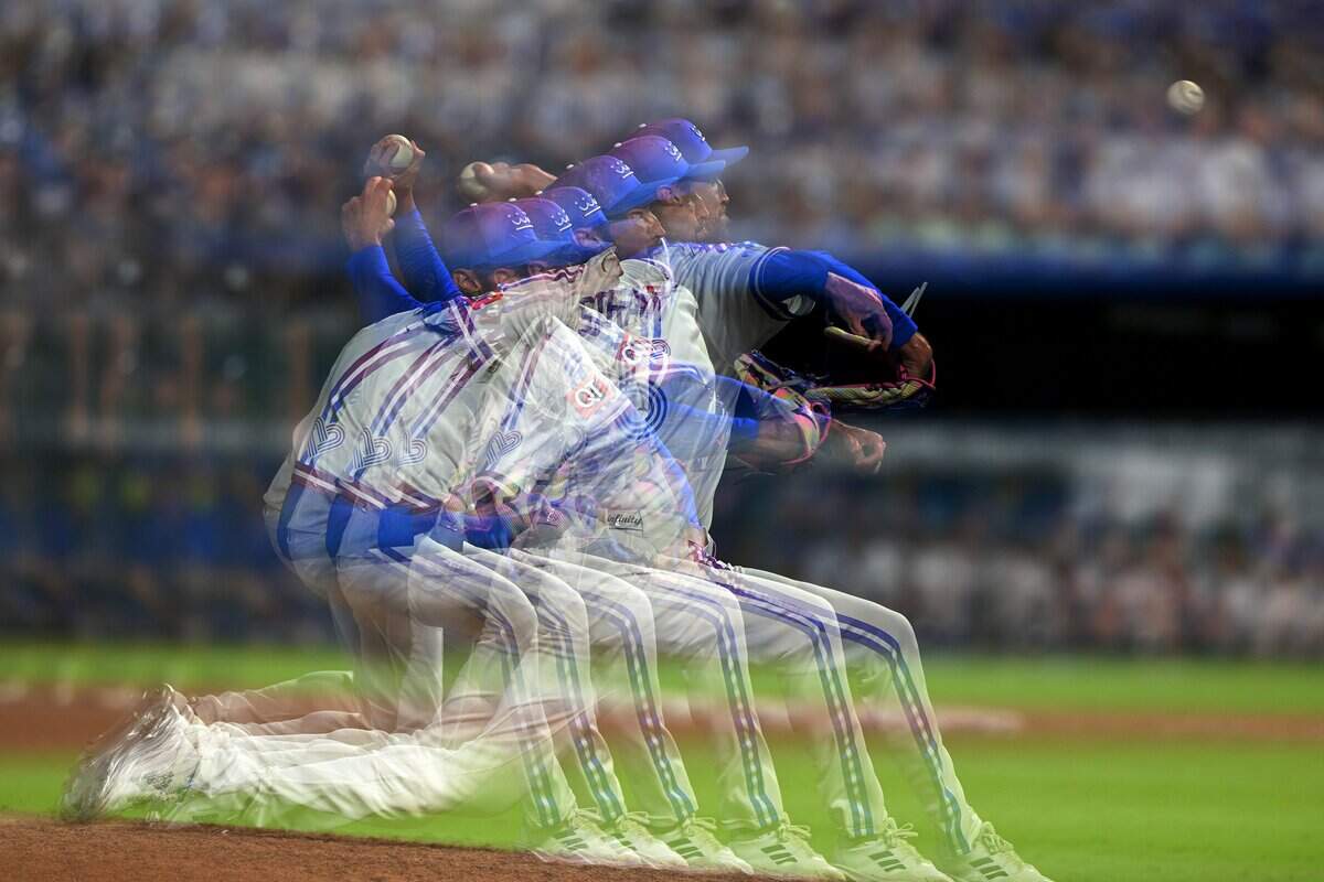 A multiple-exposure photograph shows Kansas City Royals pitcher Matt Strahm (25) during his pitching motion in the ninth inning against the Houston Astros on Friday, June 12, 2026, at Kauffman Stadium in Kansas City.