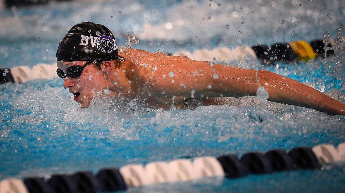 Blue Valley Northwest senior Caleb Musser competes in the 100-yard butterfly Friday, February 19, 2021, at the 6A Kansas Boys State Swimming and Diving Championships in Lenexa.