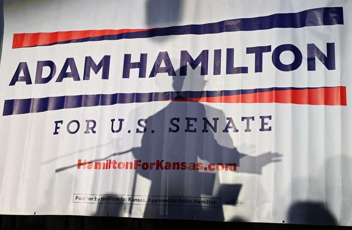 Rev. Adam Hamilton, senior pastor of the United Methodist Church of the Resurrection, speaks to a crowd of supporters at his victory party in Lenexa on Aug. 4, 2026. Hamilton won the Democratic primary for U.S. Senate in Kansas and will challenge Rep. Roger Marshall in November.