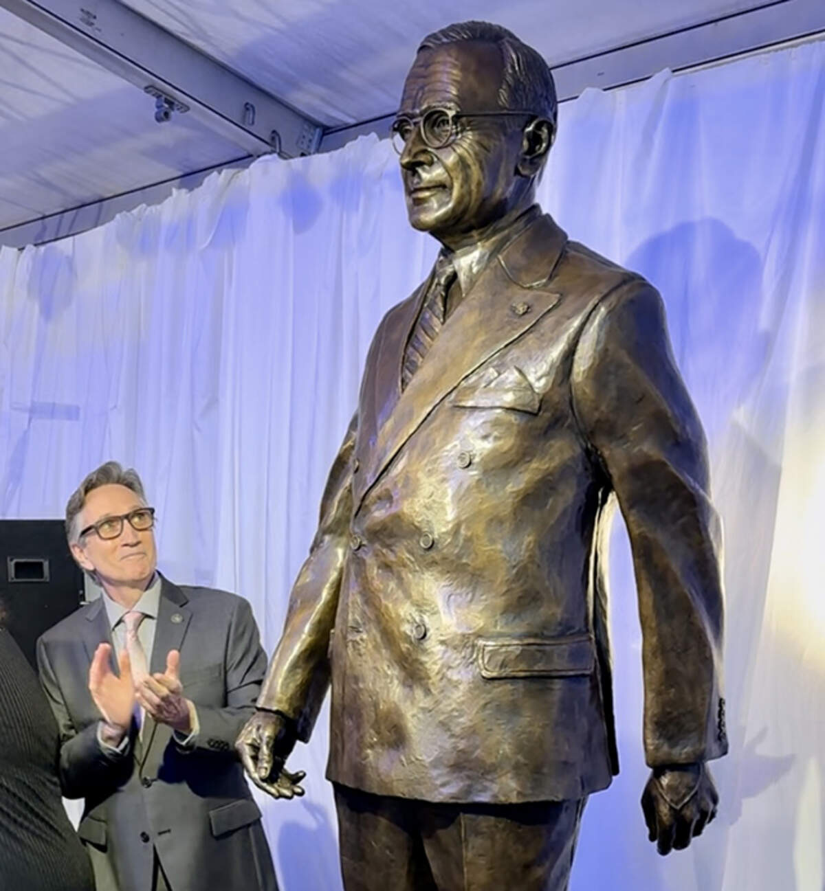 Clifton Truman Daniel looks at the statue of his grandfather unveiled Wednesday in Brussels, Belgium.