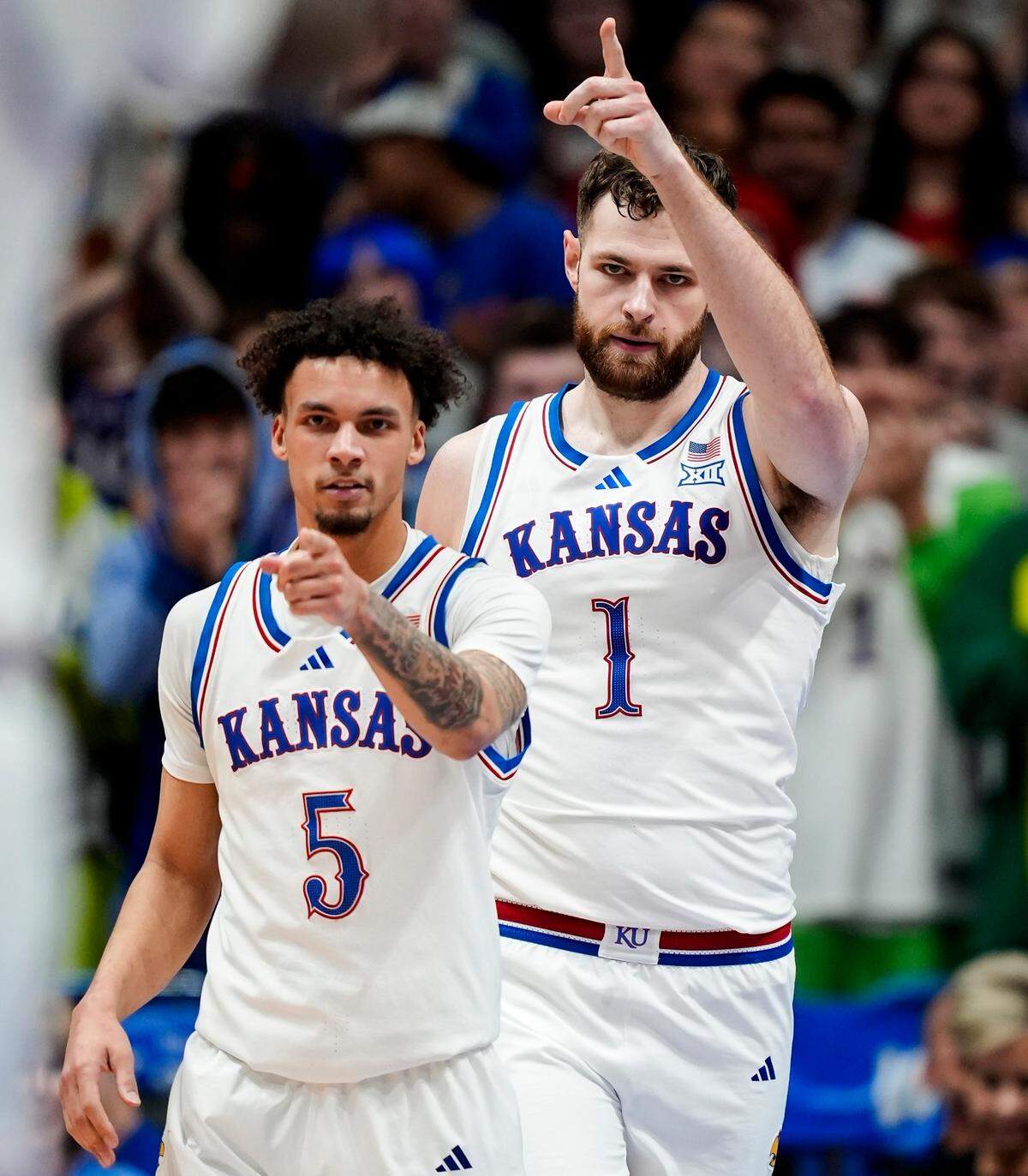 Kansas guard Zeke Mayo, left, and center Hunter Dickinson helped lead the Jayhawks to a 35-19 halftime advantage against Iowa State in a college basketball game at Allen Fieldhouse in Lawrence, Kansas, on Monday, Feb. 3, 2025.