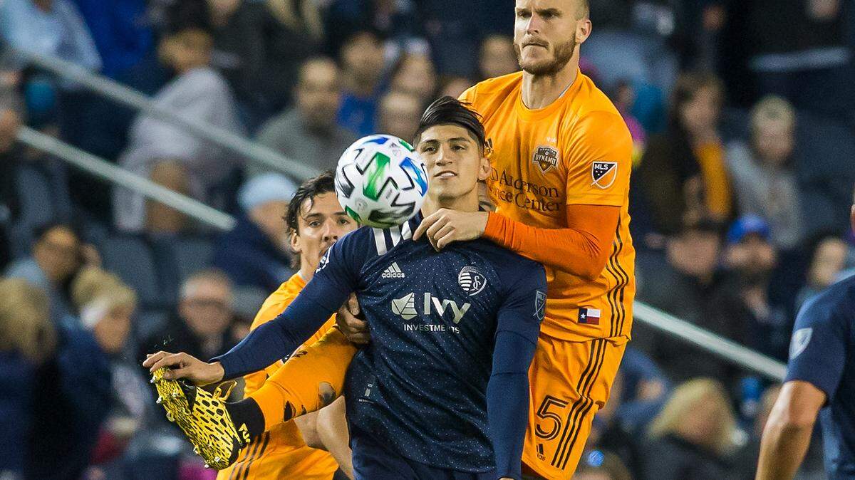Sporting Kansas City forward Alan Pulido (center) is returning from an injury that wiped out his 2022 season, which should provide a lift for the club in 2023.