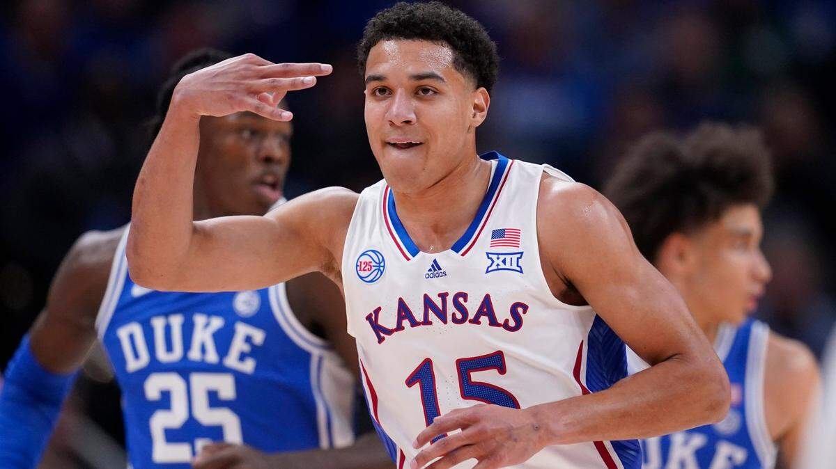 Kansas guard Kevin McCullar Jr. celebrates a score against Duke at the Champions Classic. McCullar missed KU basketball’s game vs. Texas Southern on Monday due to injury.