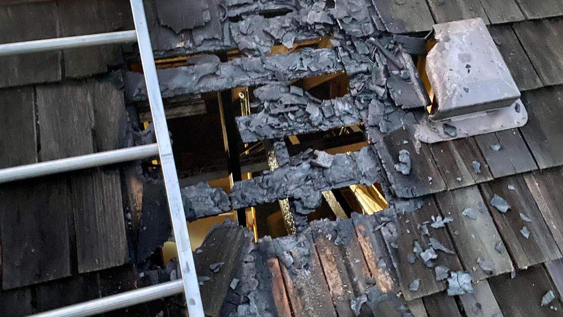 A shake shingle roof caught fire after a firework hit it Monday night at the 9300 block of West 106th Street in Overland Park. No one was injured.