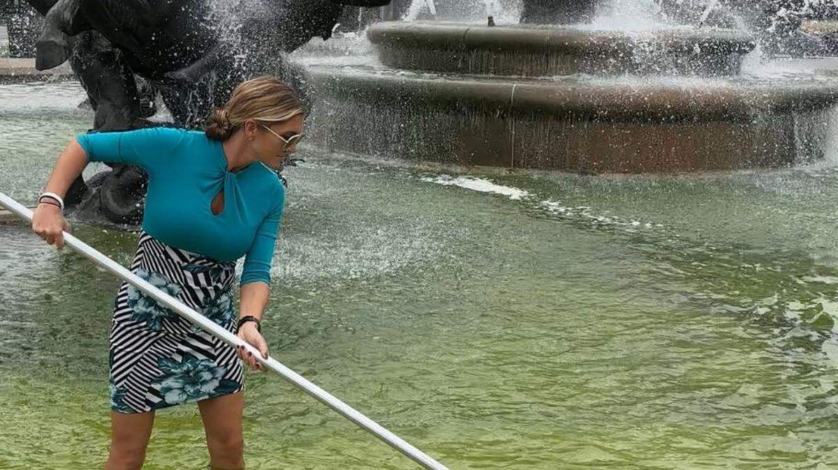 Leah Smith, a senior loan officer at Fountain Mortgage in Prairie Village, did a little cleaning of the fountain in Mill Creek Park on the Country Club Plaza this week. Her colleagues, and fellow Swifties, made a funny social media video showing them preparing Kansas City for Taylor Swift’s reported arrival.