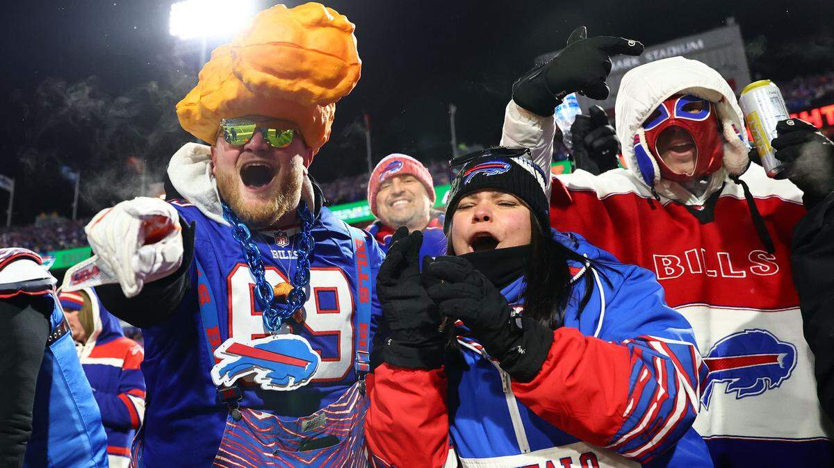 Buffalo Bills fans react against the Kansas City Chiefs during the second half for the 2024 AFC divisional round game at Highmark Stadium.