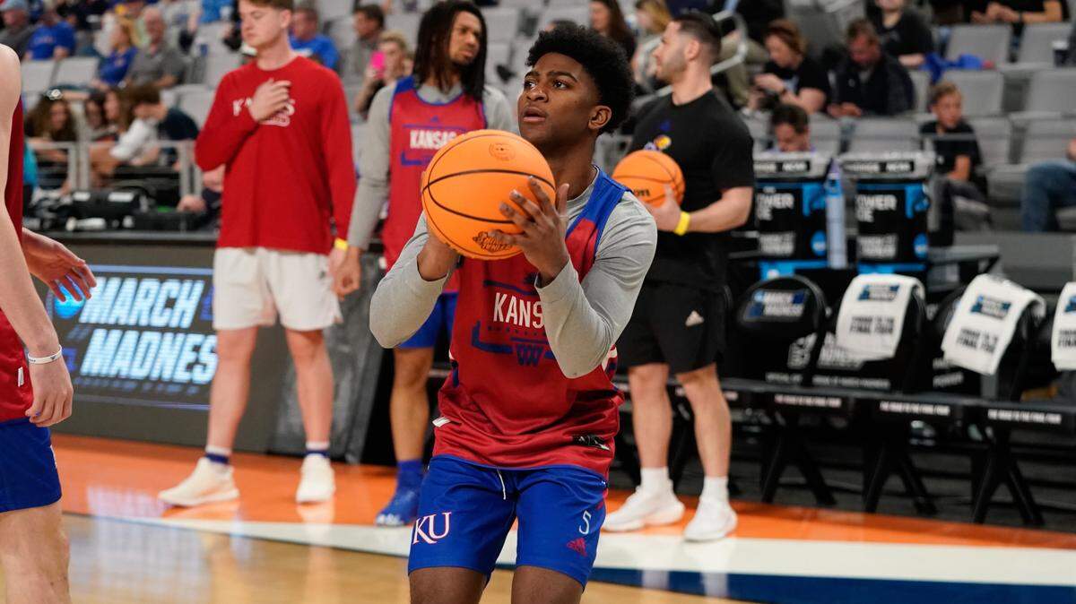 Kansas Jayhawks guard Kyle Cuffe Jr. (5) shoots during practice before the first round of the 2022 NCAA Tournament at Dickies Arena in Fort Worth, Texas, on March 16, 2022.